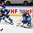MINSK, BELARUS - MAY 25: Finland's Pekka Rinne #35 makes the pad save while Atte Ohtamaa #5 and Russia's Nikolai Kulyomin #41 look on during gold medal game action at the 2014 IIHF Ice Hockey World Championship. (Photo by Andre Ringuette/HHOF-IIHF Images)

